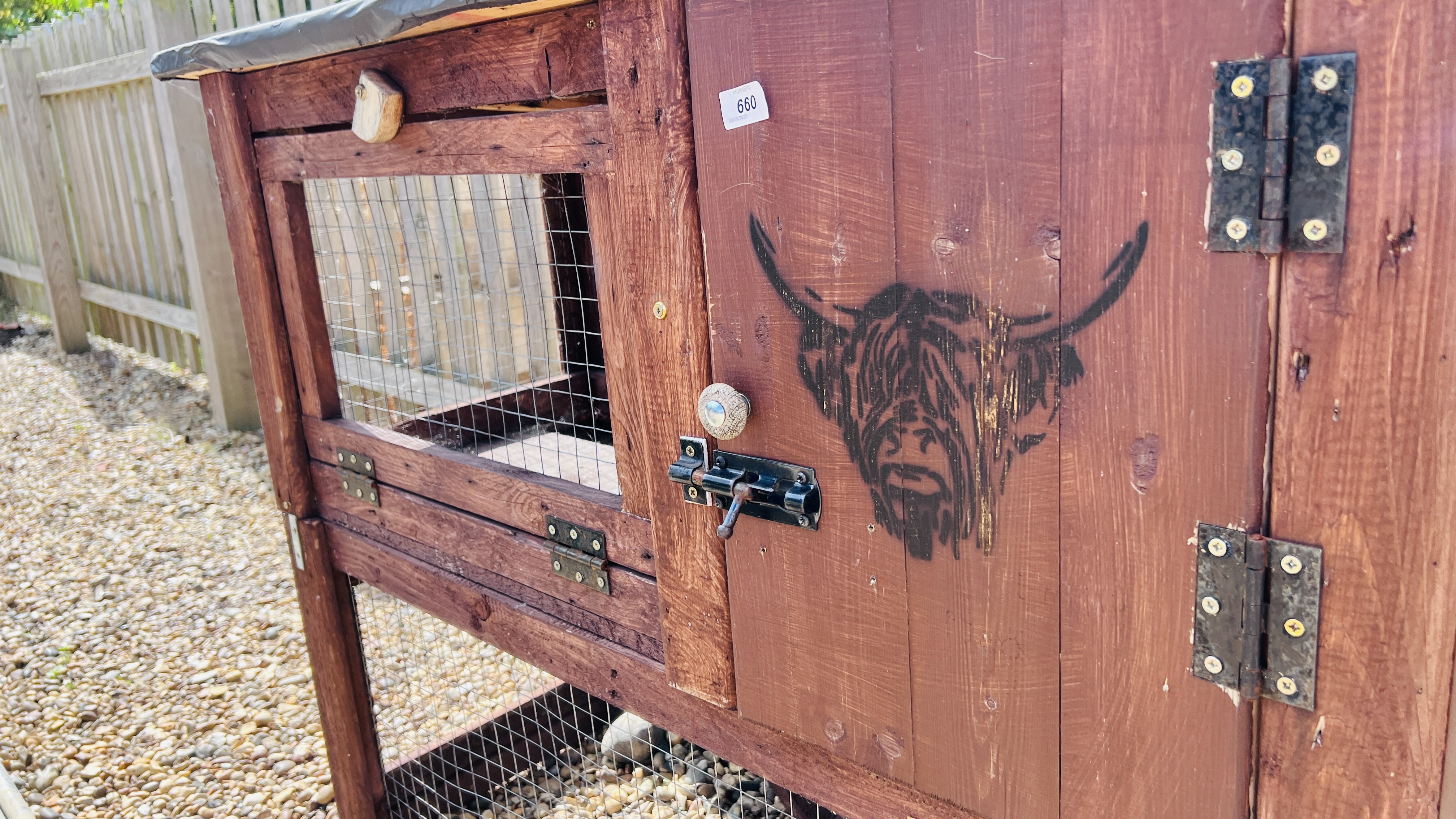 A HANDMADE TWO TIER ANIMAL HUTCH WITH BULL FACE STENCIL. - Image 3 of 3