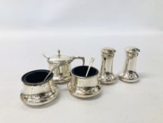 A PAIR OF SILVER SALT AND PEPPER CONDIMENTS ALONG WITH THREE SILVER MUSTARDS COMPLETE WITH LINERS