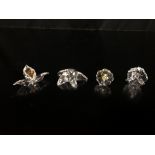 FOUR BOXED SWAROVSKI CRYSTAL CABINET ORNAMENTS TO INCLUDE AFRICAN ORCHID, STAR,