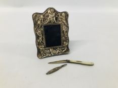 ANTIQUE SILVER PHOTO FRAME ALONG WITH A SILVER AND MOTHER OF PEARL FRUIT KNIFE + A MINATURE SILVER