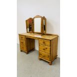 A GOOD QUALITY HONEY PINE SIX DRAWER DRESSING TABLE WITH TRIPLE DRESSING MIRROR WIDTH 143CM.