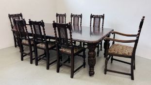 AN IMPRESSIVE VICTORIAN CARVED OAK EXTENDING DINING TABLE WITH TWO EXTENSION LEAVES,