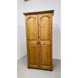 A GOOD QUALITY SOLID HONEY PINE DOUBLE WARDROBE W 96CM, D 56CM, H 188CM.