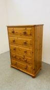 A GOOD QUALITY SOLID PINE FIVE DRAWER CHEST W 77CM, D 41CM, H 111CM.