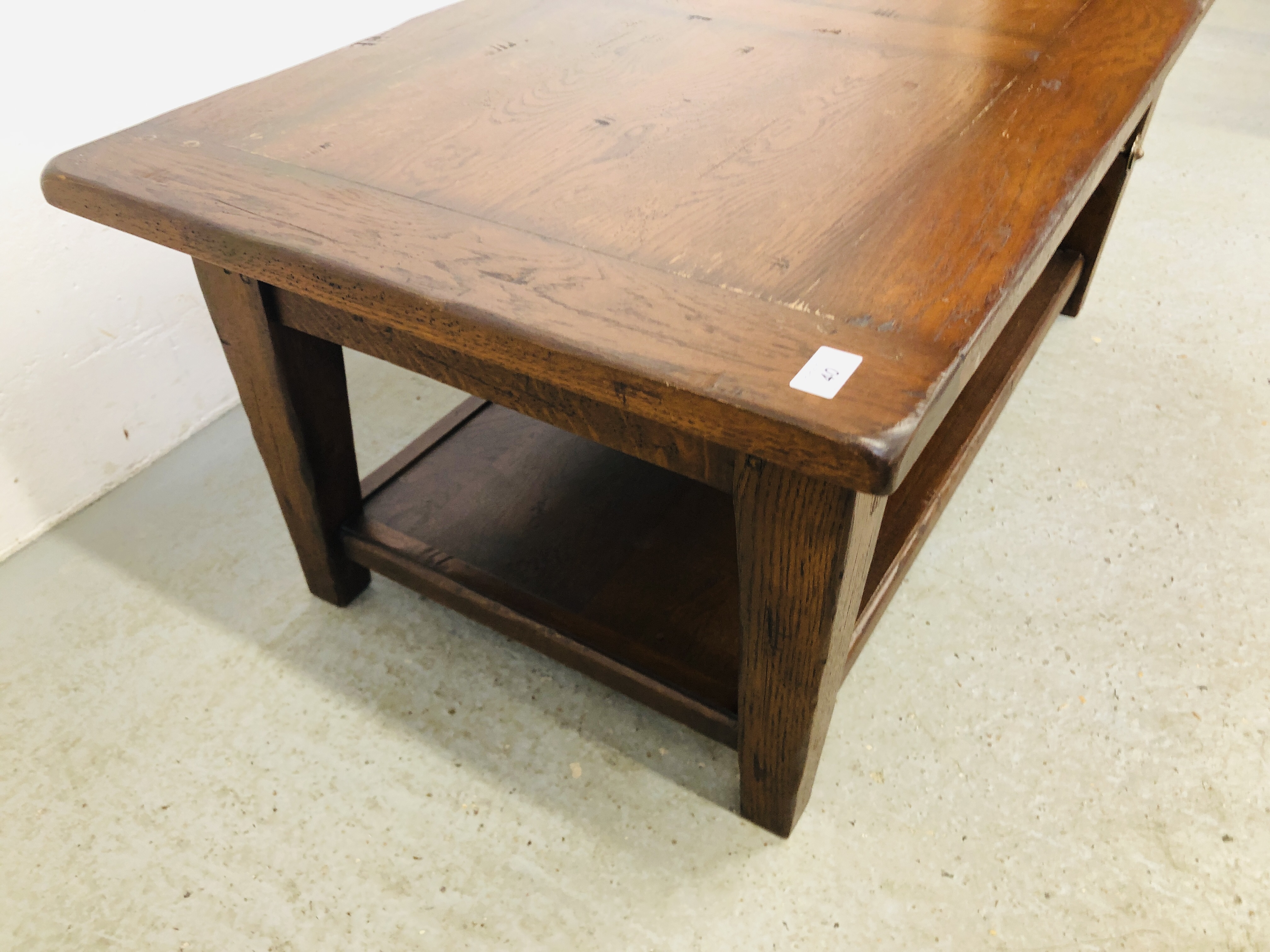 A SOLID OAK SINGLE DRAWER TWO TIER COFFEE TABLE W 59CM, L 110CM, H 46CM. - Image 7 of 7