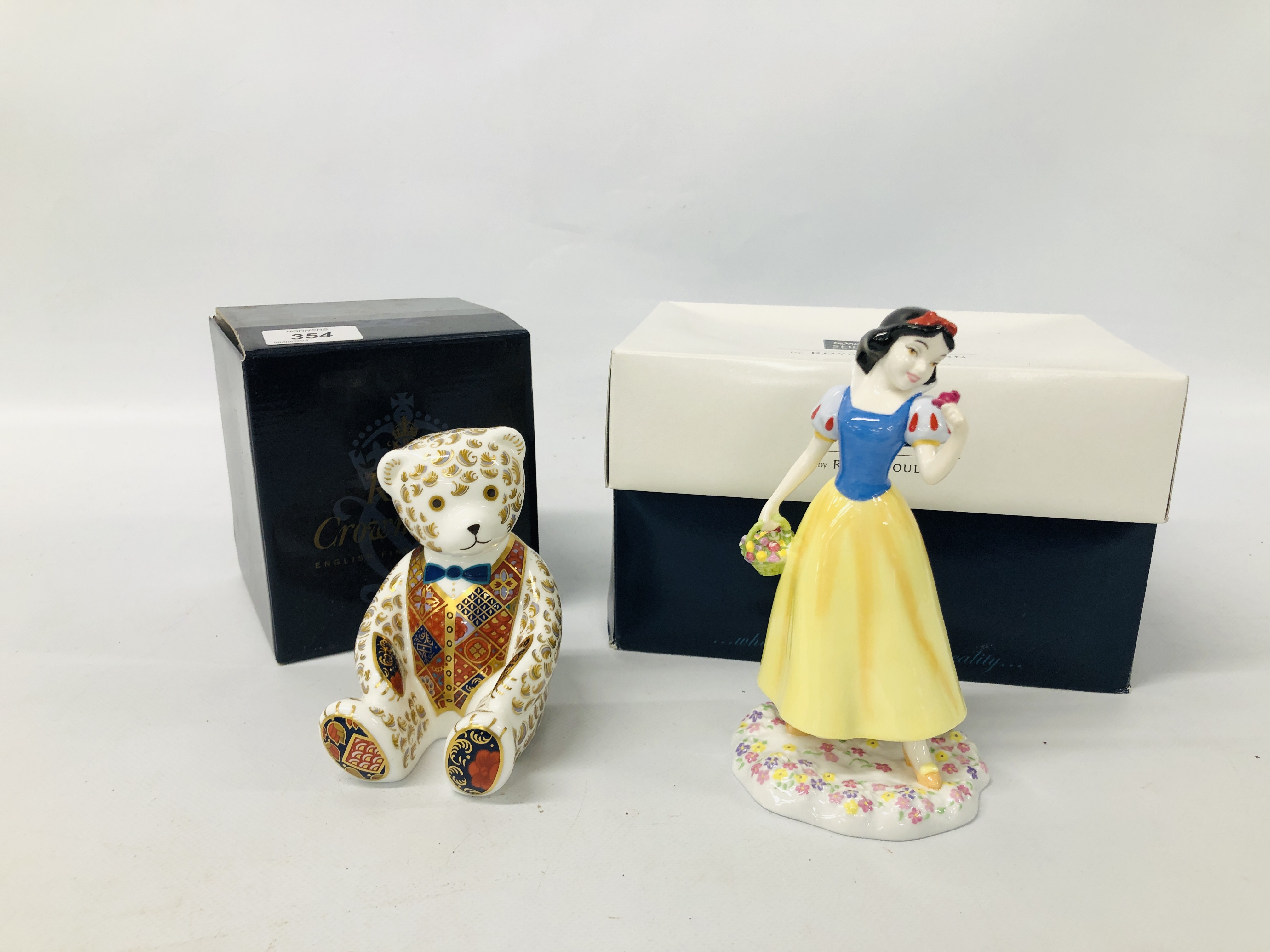 ROYAL CROWN DERBY TEDDY BEAR PAPERWEIGHT IN ORIGINAL BOX AND A ROYAL DOULTON WALT DISNEY "SNOW