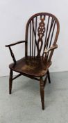 AN OAK AND ELM SEATED WHEEL BACK CHAIR