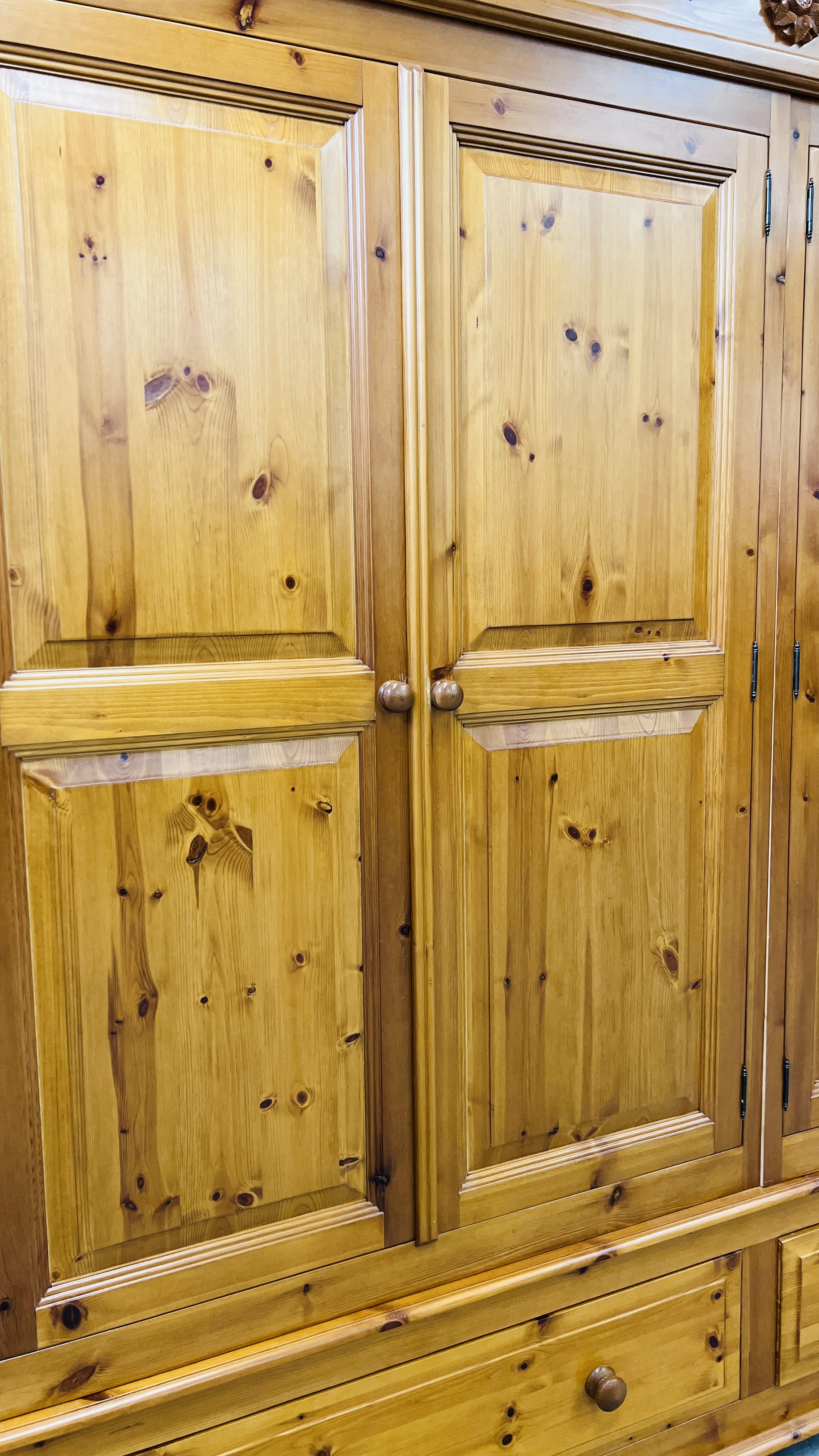 A GOOD QUALITY HONEY PINE FOUR DOOR WARDROBE WITH TWO DRAWER BASE WIDTH 228CM. DEPTH 59CM. - Image 8 of 14