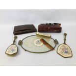 A BRASS AND GLASS DRESSING TABLE SET WITH LACE AND EMBROIDERED DETAIL TO INCLUDE TRAY, MIRRORS,