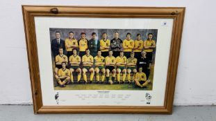 A PINE FRAMED NORWICH CITY FOOTBALL CLUB "TEAM LEGENDS" PRINT 49 X 69CM.