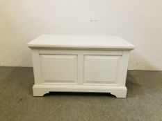 A MODERN WHITE FINISH BLANKET BOX WITH PANELLED DETAIL.