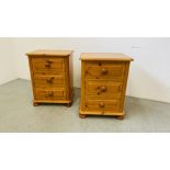 A PAIR OF GOOD QUALITY SOLID PINE THREE DRAWER BEDSIDE CHESTS - EACH W 48CM, D 43CM, H 63CM.