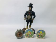 A GROUP OF FOUR VINTAGE CLOCKS TO INCLUDE CAST IRON CLOCK MAN H 41CM,