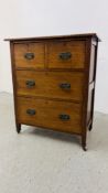 AN OAK TWO OVER TWO DRAWER CABINET WITH ART NOUVEAU HANDLES WIDTH 69CM. DEPTH 40CM. HEIGHT 83CM.