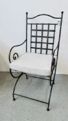 A DESIGNER METAL CRAFT CHAIR WITH CUSHIONED SEAT.