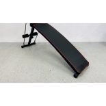 A CRIVIT SIT UP BENCH EXERCISE BOARD.