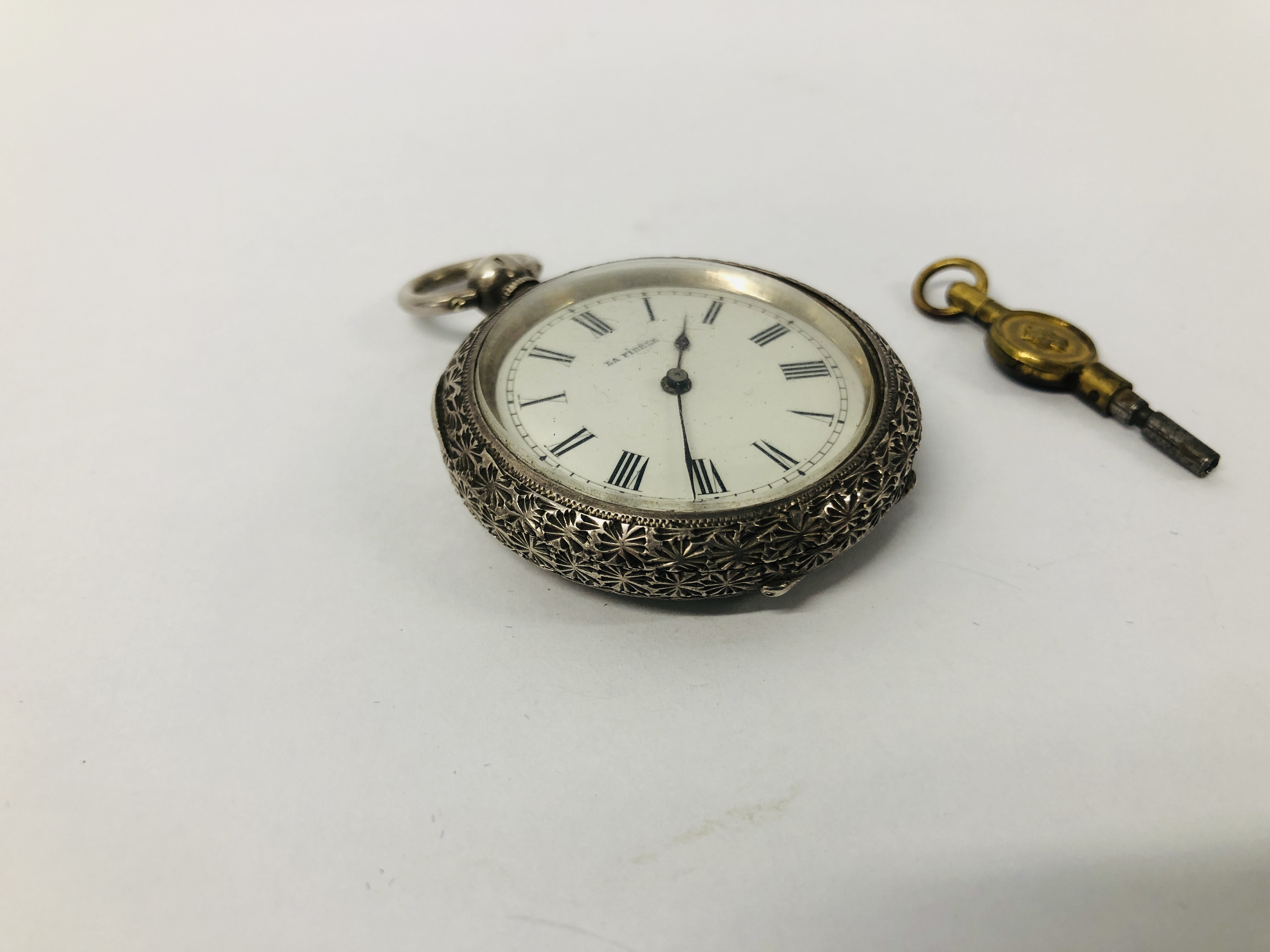 VINTAGE ORNATE SILVER POCKET WATCH MARKED "LA FIDELE", ENAMELLED DIAL AND WINDER / KEY. - Image 2 of 9