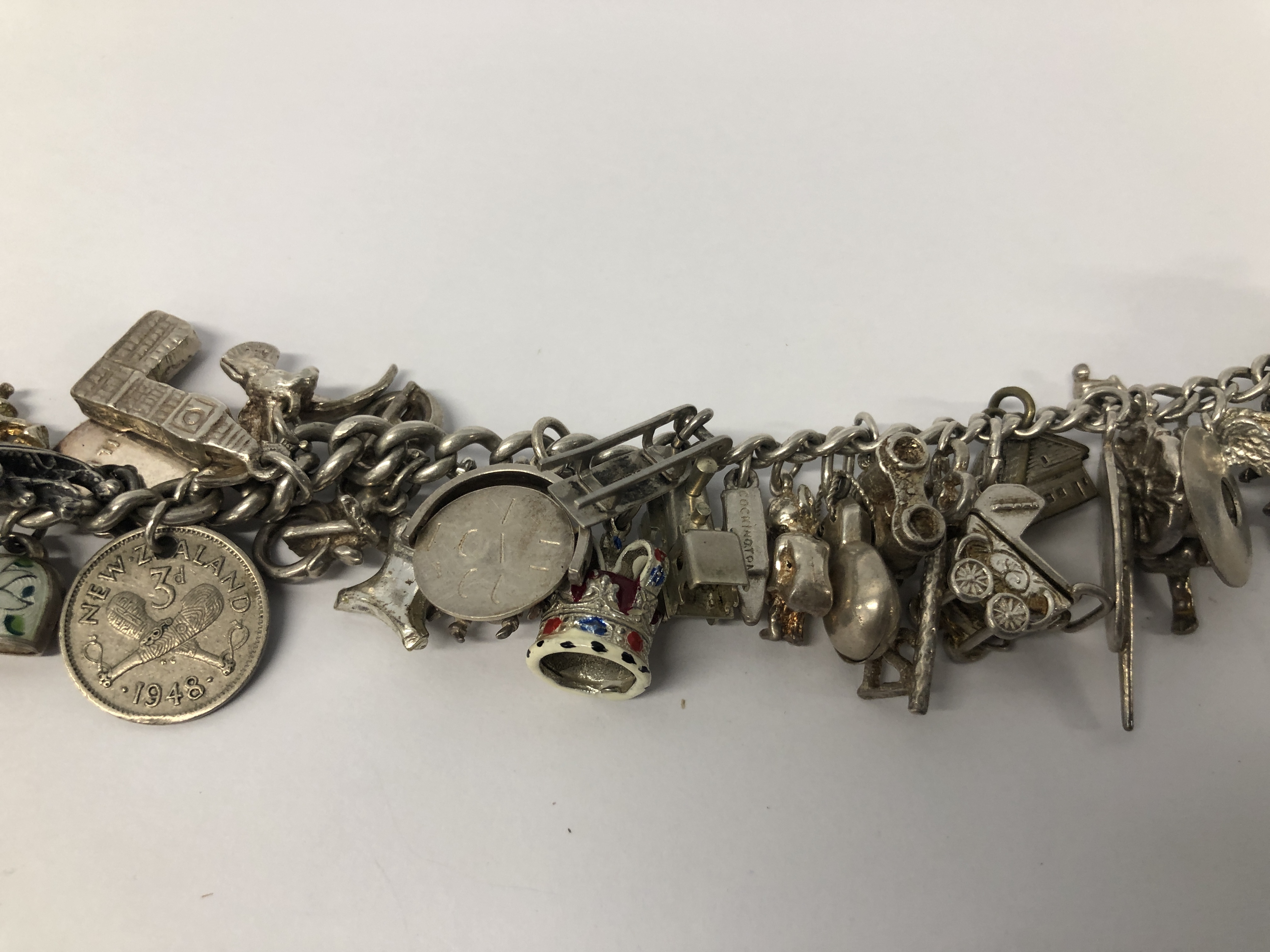 SILVER CHARM BRACELET TO INCLUDE APPROX 38 CHARMS MAINLY SILVER. - Image 3 of 6