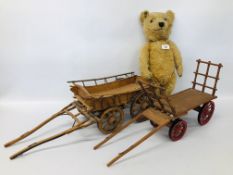 A VINTAGE CHILTERN HYGIENIC TOYS BEAR WITH GROWLER AND TWO HANDMADE MINATURE HORSE DRAWN CARTS.