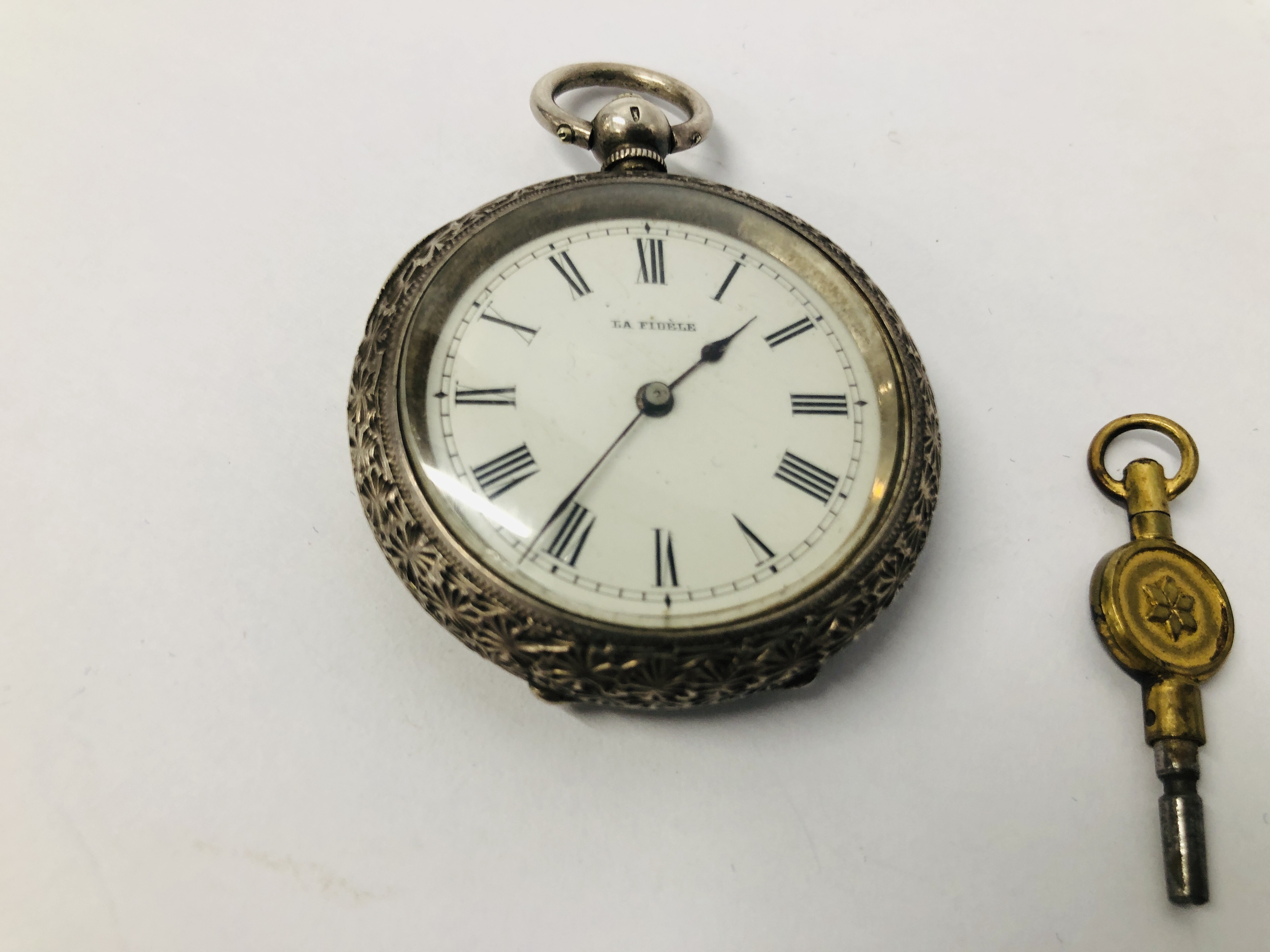 VINTAGE ORNATE SILVER POCKET WATCH MARKED "LA FIDELE", ENAMELLED DIAL AND WINDER / KEY. - Image 3 of 9