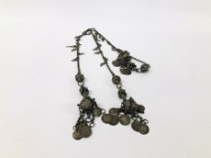 AN ANTIQUE PERSIAN DECORATIVE CHAIN WITH COIN TASSELS.