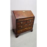 A GEORGE II WALNUT BUREAU, FALLING FRONT ENCLOSING FITTED INTERIOR WITH WELL,