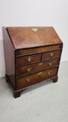 A GEORGE II WALNUT BUREAU, FALLING FRONT ENCLOSING FITTED INTERIOR WITH WELL,