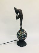 REPRODUCTION ART DECO STYLE LAMP WITH A NUDE LADY UPON A MULTI COLOURED GLASS SHADE - SOLD AS SEEN