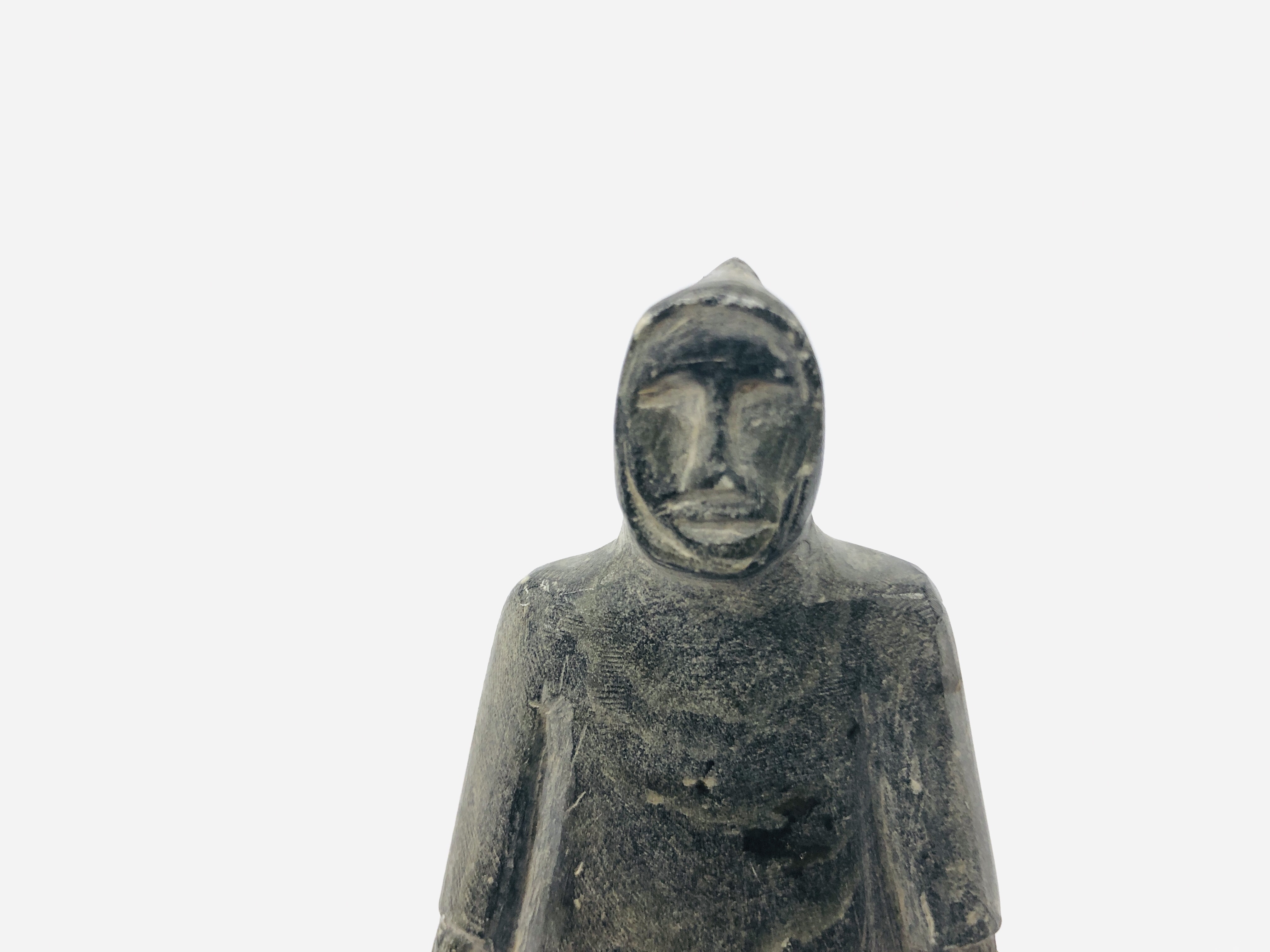 A CANADIAN CARVED SOAPSTONE OF AN INUIT FIGURE. - Image 2 of 6