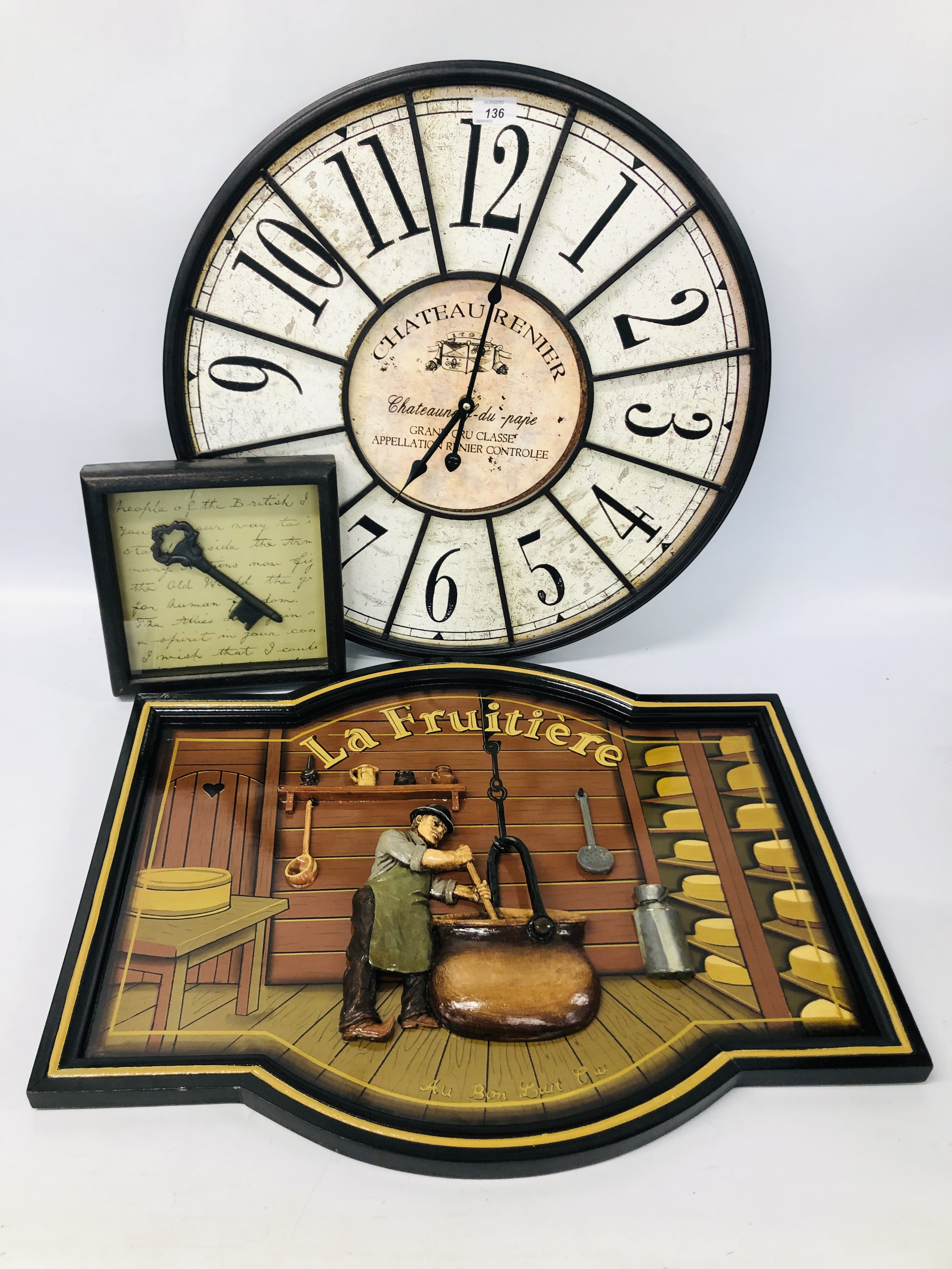 A METAL CRAFT "CHATEAU RENIER" FRAMED WALL CLOCK ALONG WITH KEY,