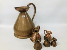 A LARGE TWO GALLON GRADUATED COPPER JUG ALONG WITH A FURTHER FIVE GRADUATED COPPER JUGS.