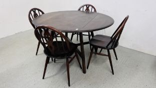 AN ERCOL DROP SIDE DINING TABLE WITH CROSS STRETCHER SUPPORT AND FOUR ERCOL DINING CHAIRS 104CM X