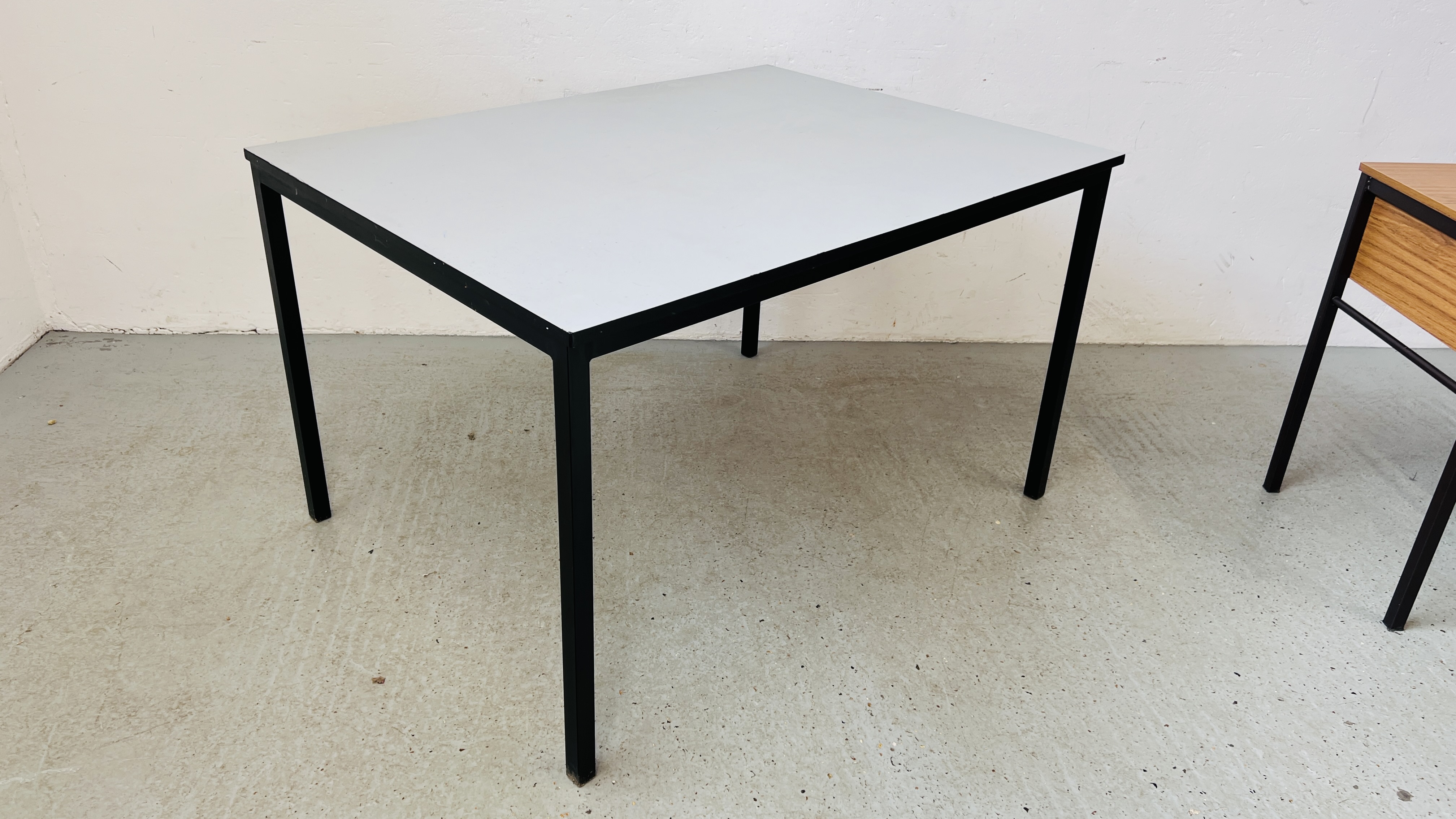 STEEL FRAMED WORK TABLE WIDTH 122CM. DEPTH 92CM. HEIGHT 74CM.