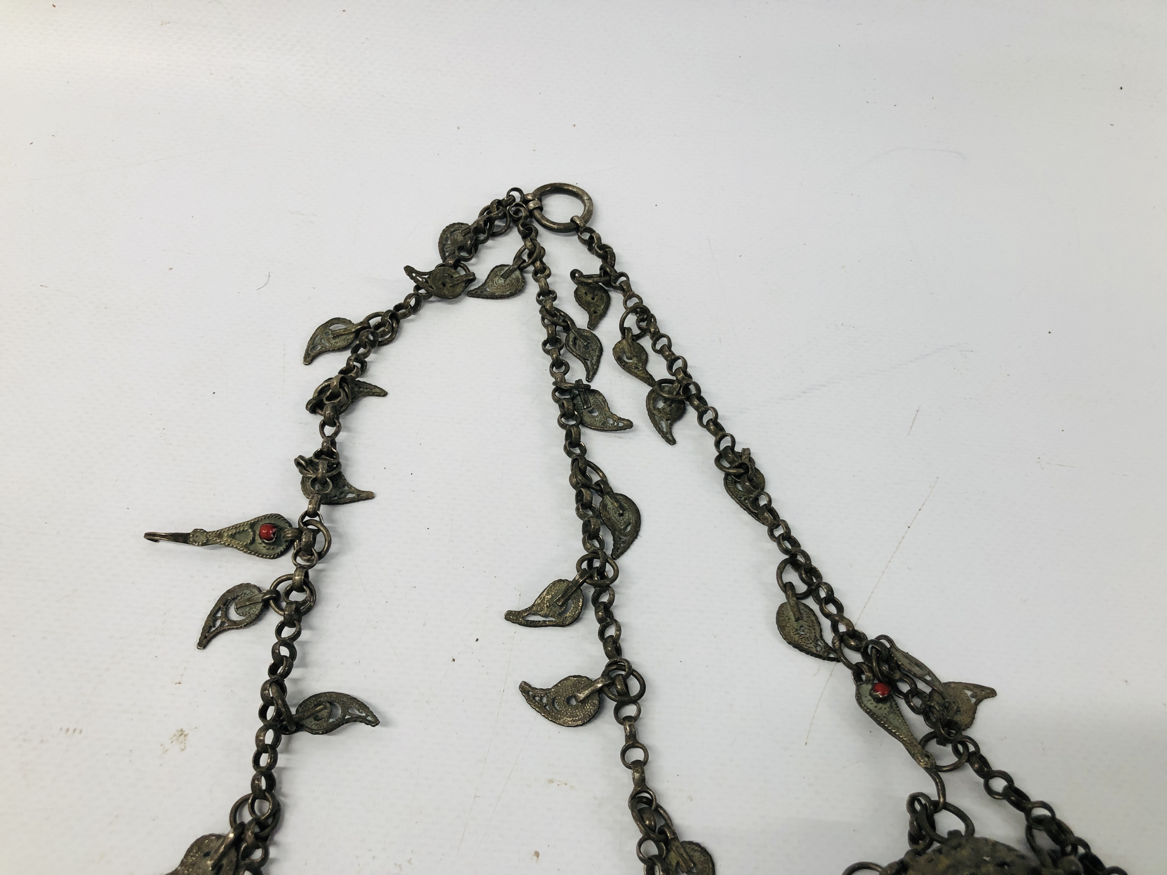 AN ANTIQUE PERSIAN DECORATIVE CHAIN WITH COIN TASSELS. - Image 6 of 6