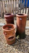 TWO TERRACOTTA CHIMNEY POTS ALONG WITH A TERRACOTTA PLANT POT