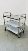 AN AS NEW STAINLESS STEEL THREE TIER TROLLEY WIDTH 75CM. LENGTH 45CM. HEIGHT 88CM.