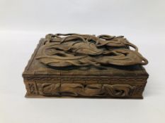 A CHINESE CARVED DRAGON DETAILED JEWELLERY BOX COMPLETE WITH KEY W 30CM, D 20CM, H 12CM.
