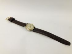 A VINTAGE CIRCA 1950 GENTLEMANS ROLEX OYSTER WRIST WATCH ON BROWN LEATHER REPLACEMENT STRAP.