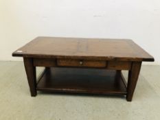 A SOLID OAK SINGLE DRAWER TWO TIER COFFEE TABLE W 59CM, L 110CM, H 46CM.