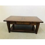 A SOLID OAK SINGLE DRAWER TWO TIER COFFEE TABLE W 59CM, L 110CM, H 46CM.