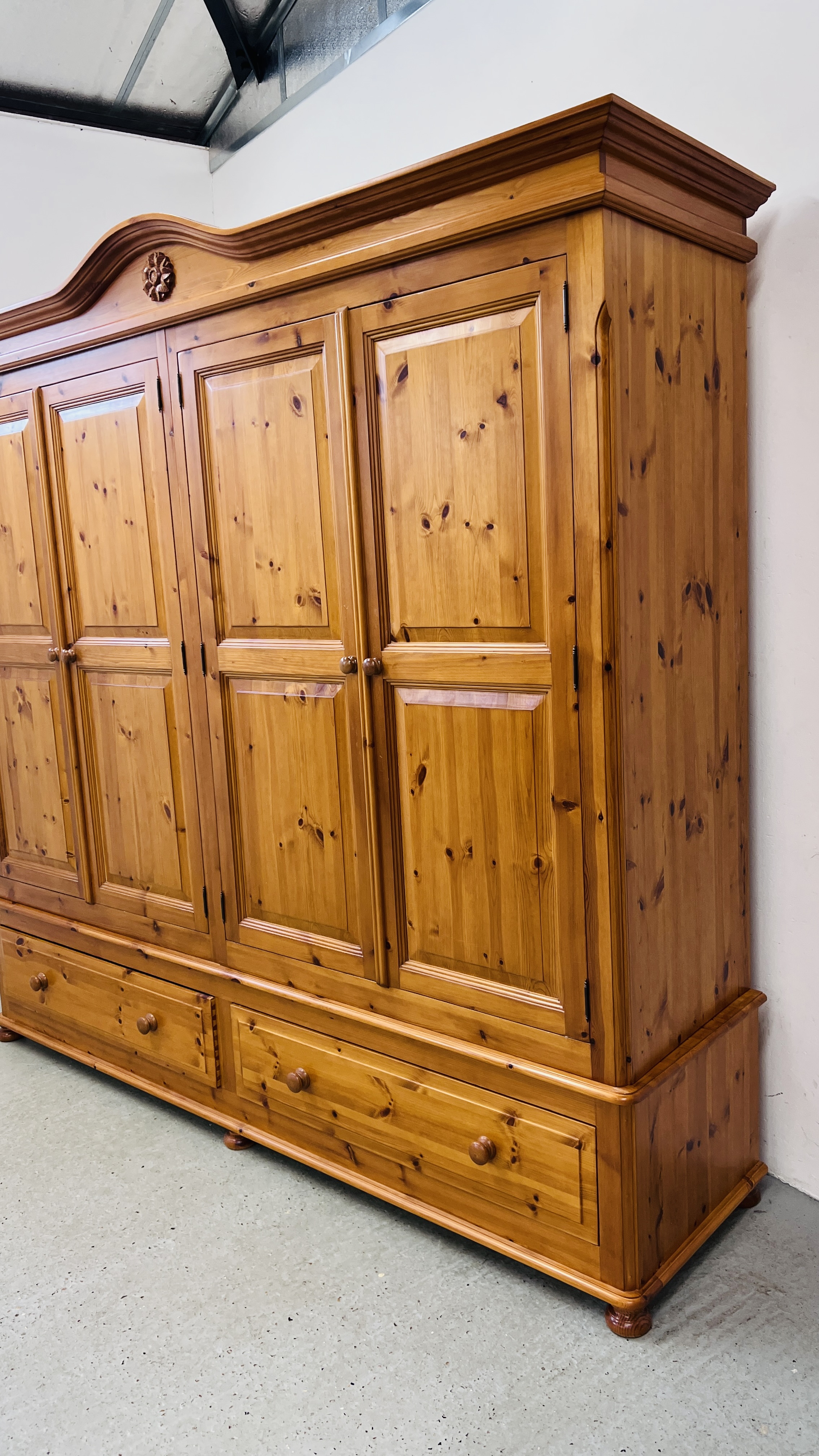 A GOOD QUALITY HONEY PINE FOUR DOOR WARDROBE WITH TWO DRAWER BASE WIDTH 228CM. DEPTH 59CM. - Image 2 of 14