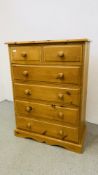 A SOLID PINE TWO OVER FOUR CHEST OF DRAWERS W 85CM, D 43CM, H 117CM.