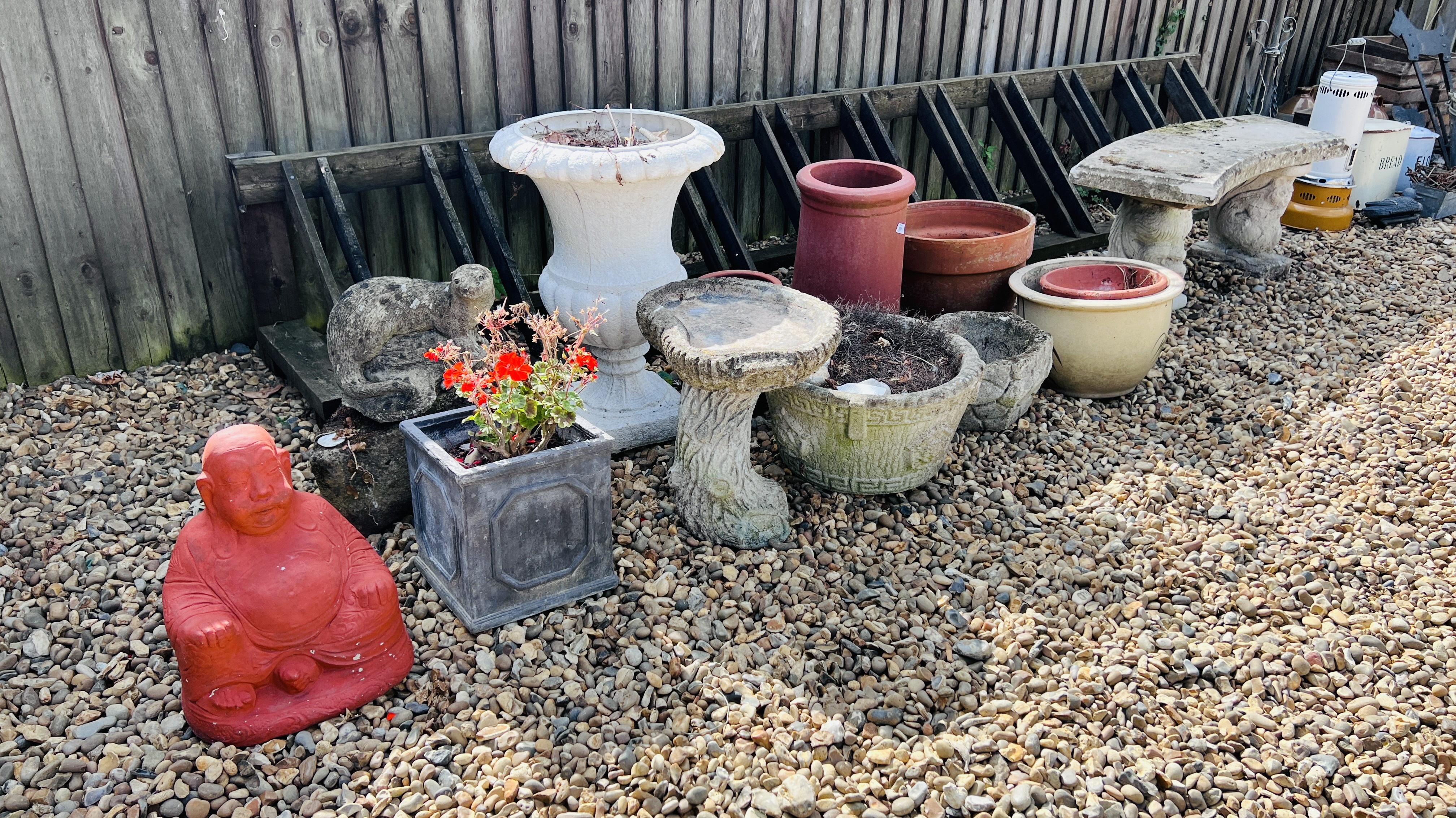 A COLLECTION OF DECORATIVE GARDEN EFFECTS TO INCLUDE PLANTERS, BIRD BATH, URN, BUDDAH,