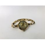 A 9CT GOLD CASED LADIES THOMAS RUSSELL & SON VINTAGE WRIST WATCH ON 9CT GOLD EXPANDING BRACELET.