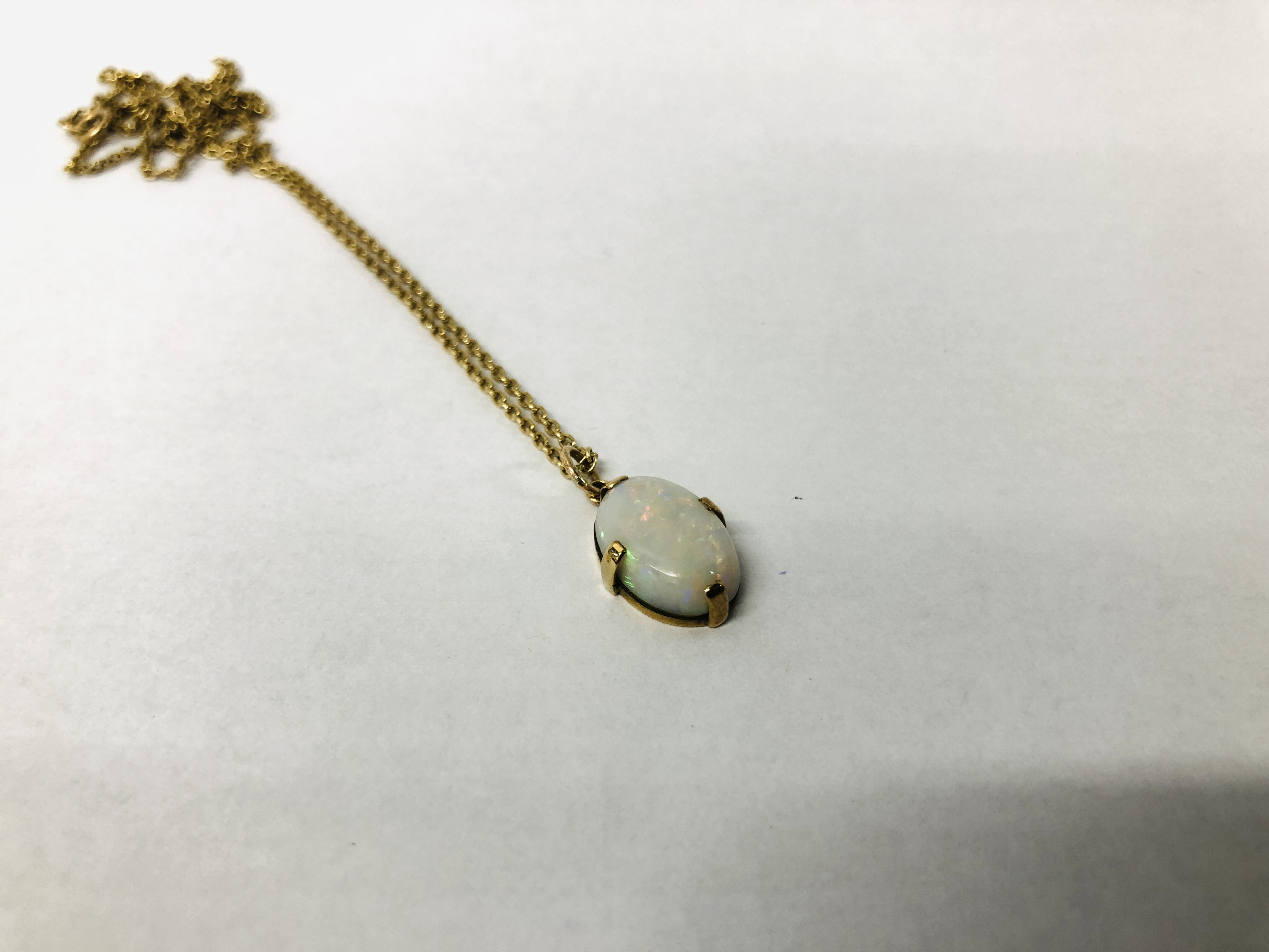 AN OPAL SET PENDANT THE NECKLACE MARKED 9K AND RING MARKED 9CT SET WITH TWO OPALS. - Image 6 of 9