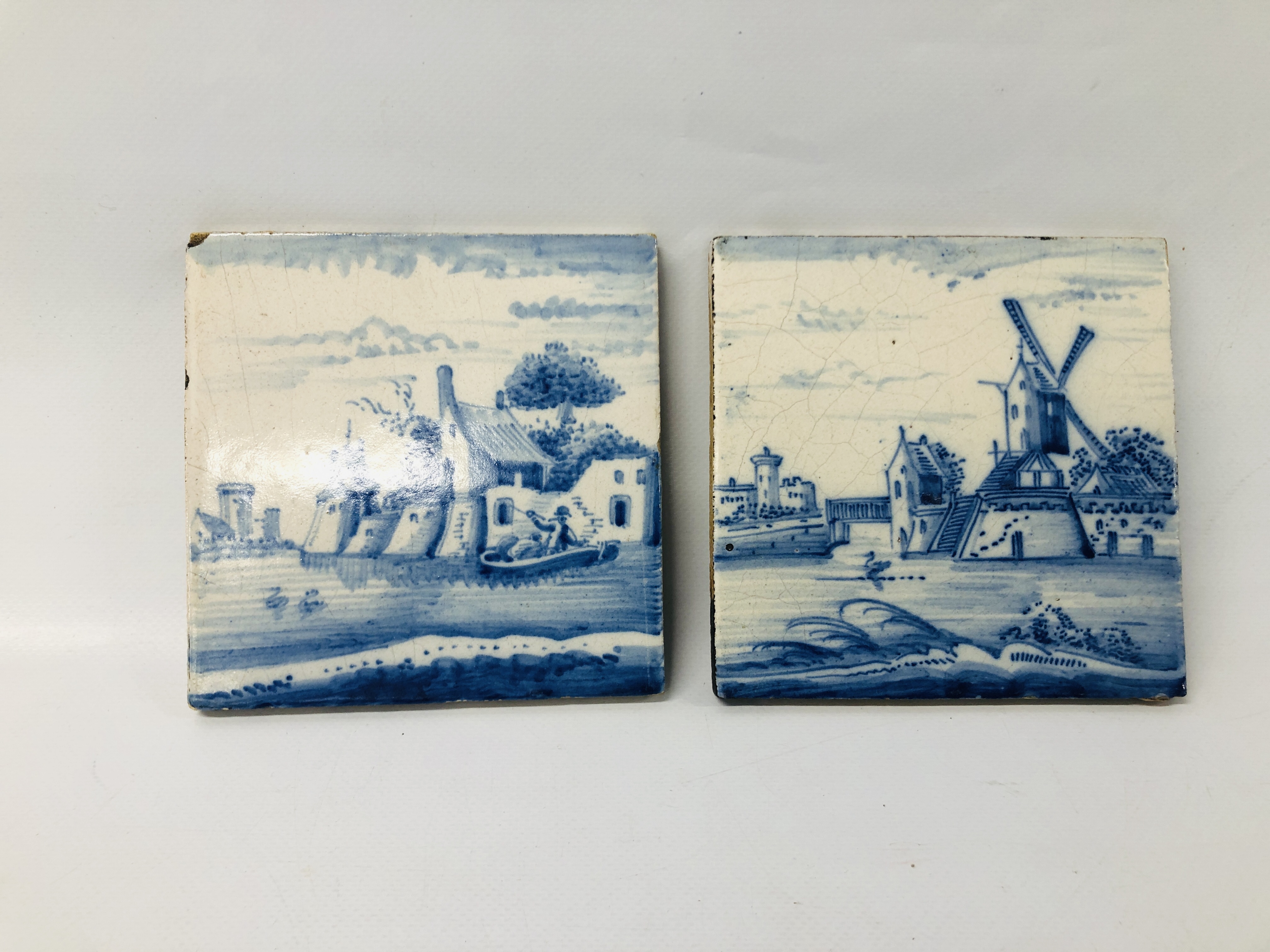 PAIR OF VINTAGE BLUE AND WHITE DELFT TILES TO INCLUDE A WINDMILL SCENE WIDTH 13.5CM HEIGHT 13.5CM.