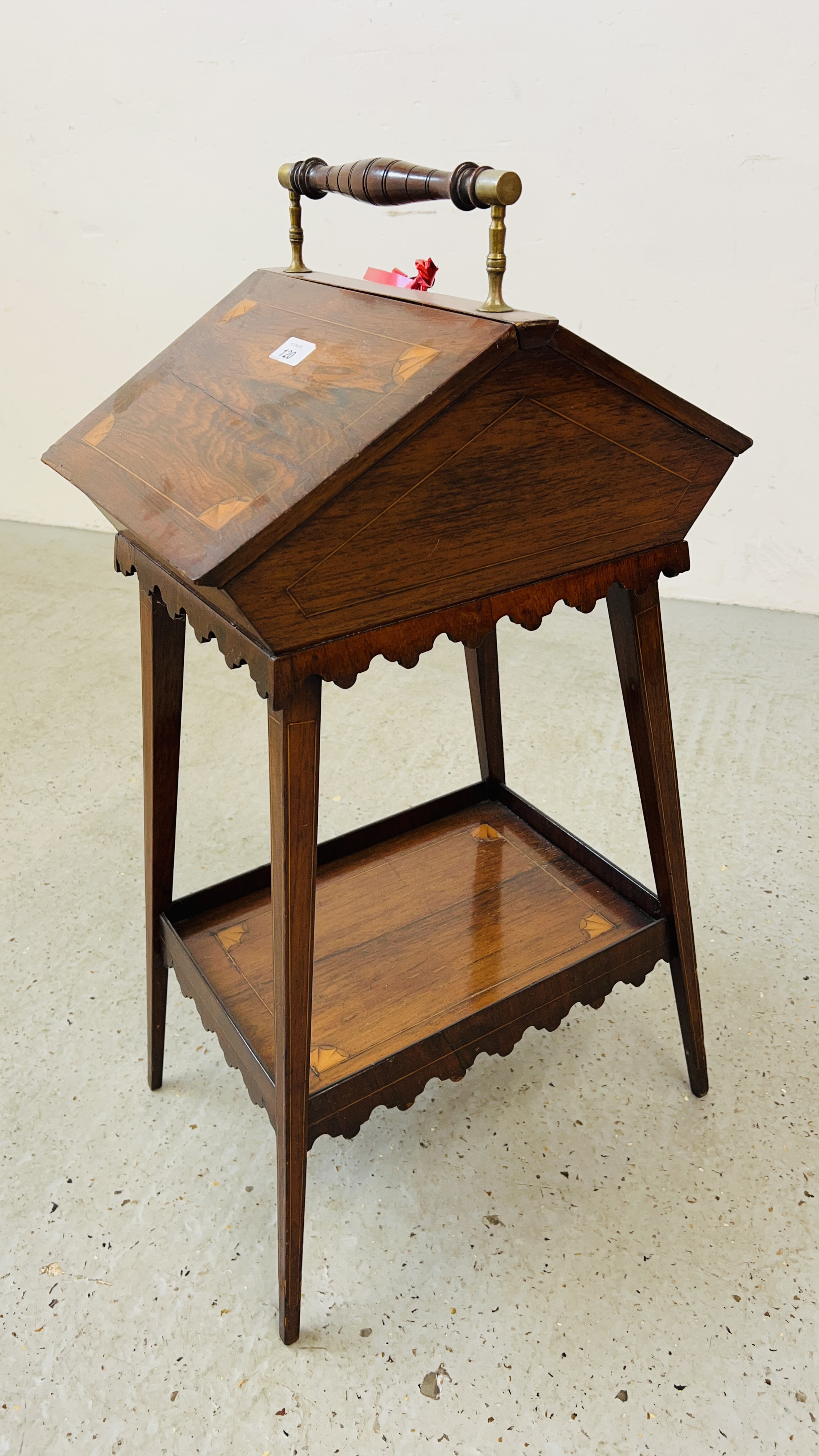 AN ANTIQUE INLAID SEWING BOX WITH SHELF BELOW, PINK CUSHIONED INSERT.