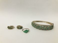 DESIGNER SILVER HINGED BANGLE SET WITH GREEN STONES IN A FLOWER HEAD DESIGN ALONG WITH A PAIR OF