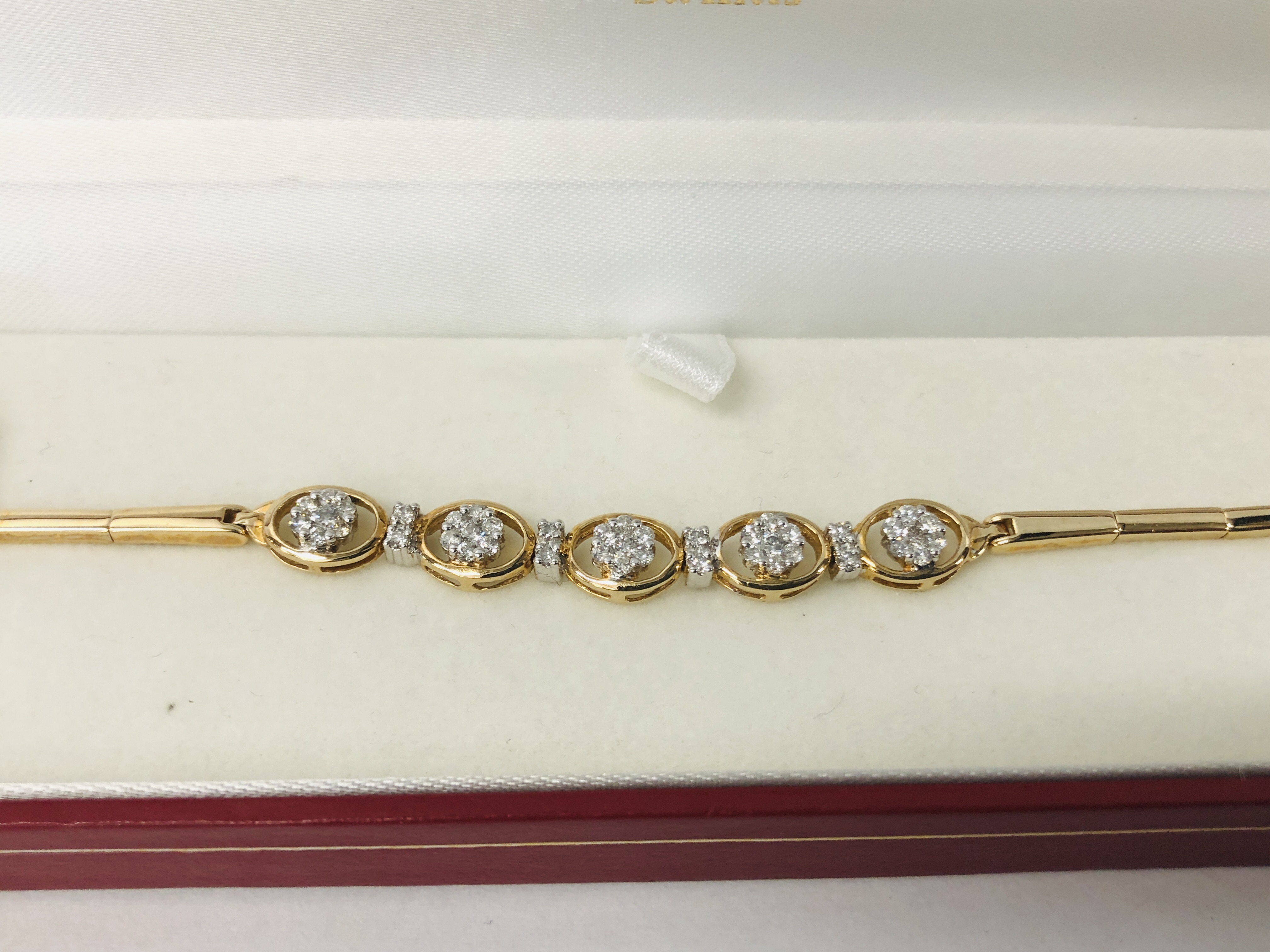 A MODERN BRACELET MARKED 585 SET WITH FORTY THREE SMALL DIAMONDS IN FLOWER HEAD SETTING ACCOMPANIED - Image 2 of 13