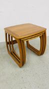 A NEST OF THREE GRADUATED MID CENTURY TEAK NATHAN TABLES, H 51CM.